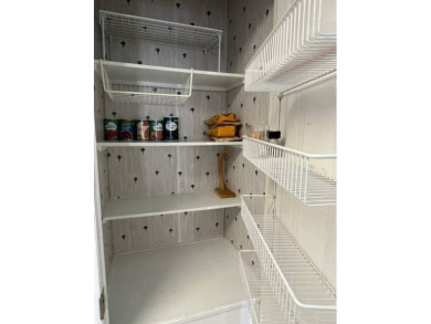 Beautiful waterfront home in The Hamptons Golf and Country Club on Hamptons Golf Club in Florida - for sale on GolfHomes.com, golf home, golf lot