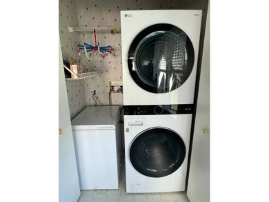 Beautiful waterfront home in The Hamptons Golf and Country Club on Hamptons Golf Club in Florida - for sale on GolfHomes.com, golf home, golf lot