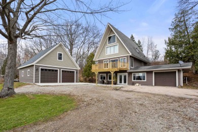 Truly a rare find! This chalet style home has been nicely on Golden Sands Golf Community in Wisconsin - for sale on GolfHomes.com, golf home, golf lot