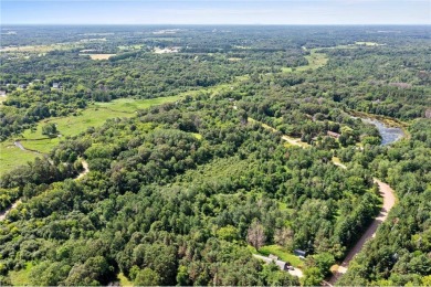 Discover your dream home site on this expansive 6-acre lot in on The Refuge Golf Club in Minnesota - for sale on GolfHomes.com, golf home, golf lot