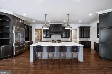 Experience the pinnacle of luxury living in this magnificent on Manor Golf and Country Club in Georgia - for sale on GolfHomes.com, golf home, golf lot