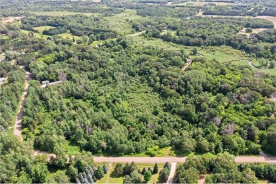 Discover your dream home site on this expansive 6-acre lot in on The Refuge Golf Club in Minnesota - for sale on GolfHomes.com, golf home, golf lot