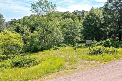 Discover your dream home site on this expansive 6-acre lot in on The Refuge Golf Club in Minnesota - for sale on GolfHomes.com, golf home, golf lot