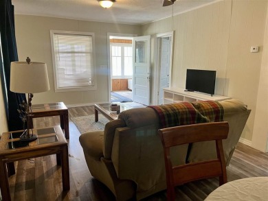 Cottage style home on Residential / Commercial lot. Located next on Charlevoix Golf Club in Michigan - for sale on GolfHomes.com, golf home, golf lot