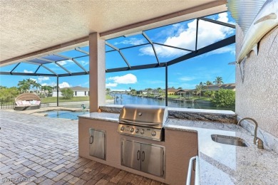 Custom-Built Waterfront Home with 307 Feet of Panoramic Water on Palmetto-Pine Country Club in Florida - for sale on GolfHomes.com, golf home, golf lot