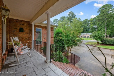 Step into this extraordinary custom-built home in Cypress on Cypress Landing Golf Club in North Carolina - for sale on GolfHomes.com, golf home, golf lot