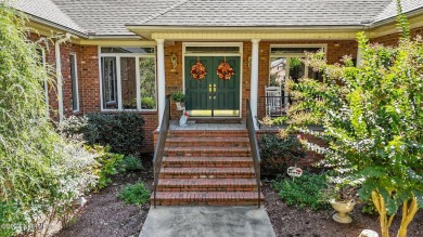 Step into this extraordinary custom-built home in Cypress on Cypress Landing Golf Club in North Carolina - for sale on GolfHomes.com, golf home, golf lot