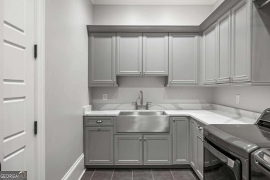 Experience the pinnacle of luxury living in this magnificent on Manor Golf and Country Club in Georgia - for sale on GolfHomes.com, golf home, golf lot