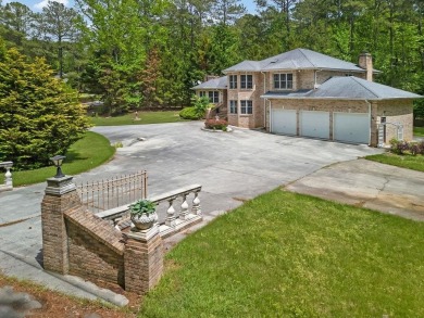 Get ready to fall in love with this stunning all-brick 6-bedroom on Fairfield Plantation Golf and Country Club in Georgia - for sale on GolfHomes.com, golf home, golf lot