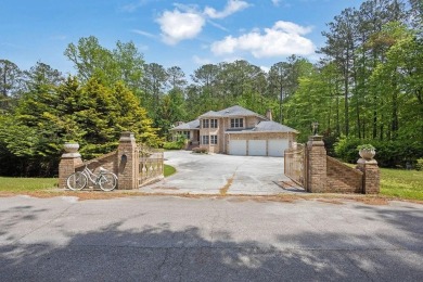 Get ready to fall in love with this stunning all-brick 6-bedroom on Fairfield Plantation Golf and Country Club in Georgia - for sale on GolfHomes.com, golf home, golf lot