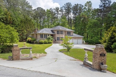 Get ready to fall in love with this stunning all-brick 6-bedroom on Fairfield Plantation Golf and Country Club in Georgia - for sale on GolfHomes.com, golf home, golf lot