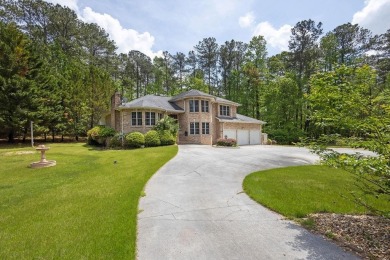 Get ready to fall in love with this stunning all-brick 6-bedroom on Fairfield Plantation Golf and Country Club in Georgia - for sale on GolfHomes.com, golf home, golf lot
