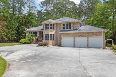 Get ready to fall in love with this stunning all-brick 6-bedroom on Fairfield Plantation Golf and Country Club in Georgia - for sale on GolfHomes.com, golf home, golf lot