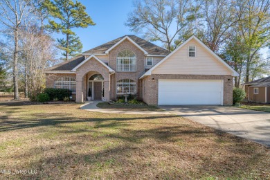 Welcome to this delightful 3-bedroom, 2.5-bathroom gem nestled on Diamondhead Country Club in Mississippi - for sale on GolfHomes.com, golf home, golf lot