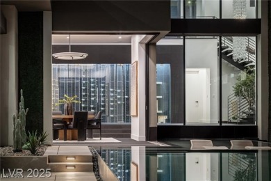 Wow! This ultra modern FULLY CUSTOM MASTERPIECE is on Dragon Ridge Country Club in Nevada - for sale on GolfHomes.com, golf home, golf lot