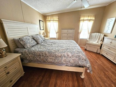 This home is located on leased land in a 55+ resort-style MH on Big Cypress Golf and Country Club in Florida - for sale on GolfHomes.com, golf home, golf lot