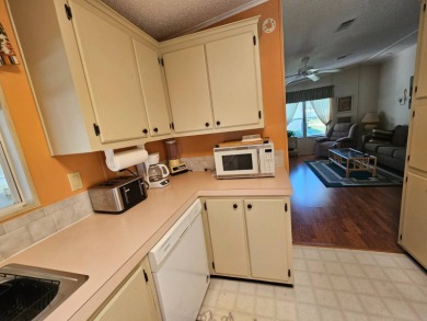 This home is located on leased land in a 55+ resort-style MH on Big Cypress Golf and Country Club in Florida - for sale on GolfHomes.com, golf home, golf lot