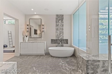 Wow! This ultra modern FULLY CUSTOM MASTERPIECE is on Dragon Ridge Country Club in Nevada - for sale on GolfHomes.com, golf home, golf lot