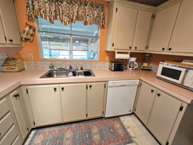 This home is located on leased land in a 55+ resort-style MH on Big Cypress Golf and Country Club in Florida - for sale on GolfHomes.com, golf home, golf lot