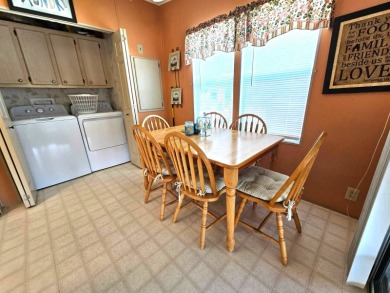 This home is located on leased land in a 55+ resort-style MH on Big Cypress Golf and Country Club in Florida - for sale on GolfHomes.com, golf home, golf lot