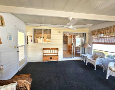 This home is located on leased land in a 55+ resort-style MH on Big Cypress Golf and Country Club in Florida - for sale on GolfHomes.com, golf home, golf lot