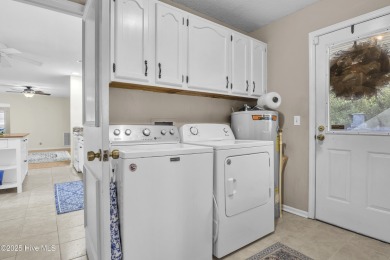 This 4-bedroom ranch sits on just under a half of an acre in on Brierwood Golf Club in North Carolina - for sale on GolfHomes.com, golf home, golf lot