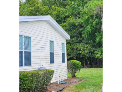This home is located on leased land in a 55+ resort-style MH on Big Cypress Golf and Country Club in Florida - for sale on GolfHomes.com, golf home, golf lot