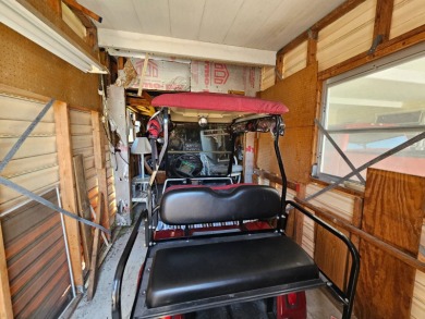 This home is located on leased land in a 55+ resort-style MH on Big Cypress Golf and Country Club in Florida - for sale on GolfHomes.com, golf home, golf lot