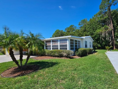 This home is located on leased land in a 55+ resort-style MH on Big Cypress Golf and Country Club in Florida - for sale on GolfHomes.com, golf home, golf lot