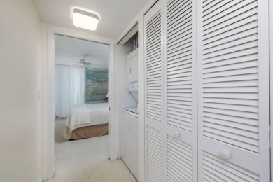 Capture the allure of Florida's Treasure Coast in this serene on Island Dunes Country Club in Florida - for sale on GolfHomes.com, golf home, golf lot
