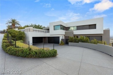 Wow! This ultra modern FULLY CUSTOM MASTERPIECE is on Dragon Ridge Country Club in Nevada - for sale on GolfHomes.com, golf home, golf lot