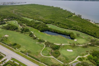 Capture the allure of Florida's Treasure Coast in this serene on Island Dunes Country Club in Florida - for sale on GolfHomes.com, golf home, golf lot