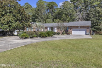 This 4-bedroom ranch sits on just under a half of an acre in on Brierwood Golf Club in North Carolina - for sale on GolfHomes.com, golf home, golf lot