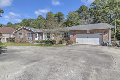 This 4-bedroom ranch sits on just under a half of an acre in on Brierwood Golf Club in North Carolina - for sale on GolfHomes.com, golf home, golf lot