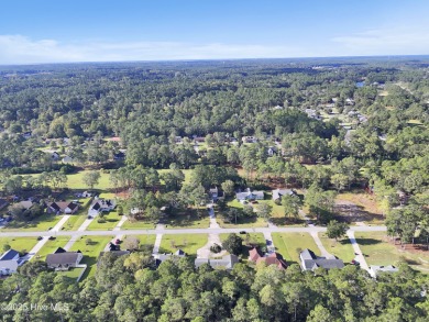 This 4-bedroom ranch sits on just under a half of an acre in on Brierwood Golf Club in North Carolina - for sale on GolfHomes.com, golf home, golf lot