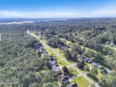 This 4-bedroom ranch sits on just under a half of an acre in on Brierwood Golf Club in North Carolina - for sale on GolfHomes.com, golf home, golf lot