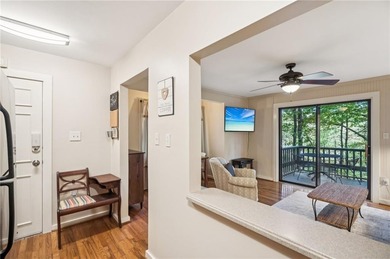 Discover the perfect mountain retreat in this beautifully on Big Canoe Golf Club - Cherokee in Georgia - for sale on GolfHomes.com, golf home, golf lot