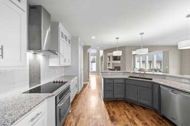 This beautiful two-story home backs up to hole number 16 on the on Golf Club of Creekmoor in Missouri - for sale on GolfHomes.com, golf home, golf lot