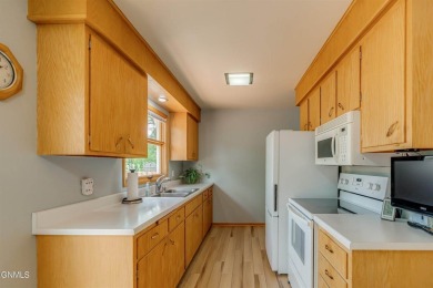Rare, one-owner home in a fantastic neighborhood close to the on Tom O Leary Golf Course in North Dakota - for sale on GolfHomes.com, golf home, golf lot