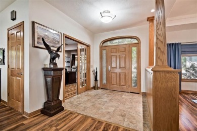Open the door to this stunning home and be awed by the on Holiday Island Golf Course in Arkansas - for sale on GolfHomes.com, golf home, golf lot