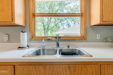 Rare, one-owner home in a fantastic neighborhood close to the on Tom O Leary Golf Course in North Dakota - for sale on GolfHomes.com, golf home, golf lot