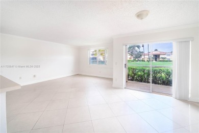 GATED COMMUNITY GROUND FLOOR LOCATION TILE FLOOR FULL SIZED on Oaks Country Club in Florida - for sale on GolfHomes.com, golf home, golf lot