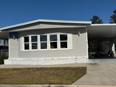 This elegantly updated 1973 home offers modern charm and on Heather Hills Golf Course in Florida - for sale on GolfHomes.com, golf home, golf lot