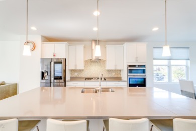 Welcome to this stunning and spacious end-unit home, built in on Seven Bridges Golf Club in Illinois - for sale on GolfHomes.com, golf home, golf lot