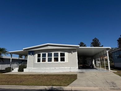 This elegantly updated 1973 home offers modern charm and on Heather Hills Golf Course in Florida - for sale on GolfHomes.com, golf home, golf lot