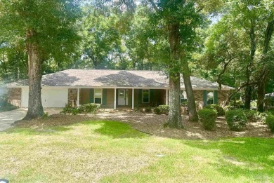 Discover Your Dream Home Nestled in Majestic Live Oaks! Welcome on Scenic Hills Country Club in Florida - for sale on GolfHomes.com, golf home, golf lot