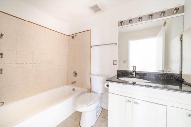 GATED COMMUNITY GROUND FLOOR LOCATION TILE FLOOR FULL SIZED on Oaks Country Club in Florida - for sale on GolfHomes.com, golf home, golf lot
