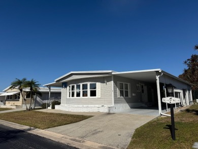 This elegantly updated 1973 home offers modern charm and on Heather Hills Golf Course in Florida - for sale on GolfHomes.com, golf home, golf lot