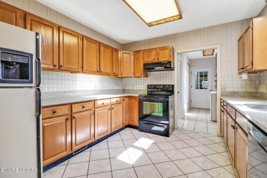 Looking for a warm, inviting home with a seasonal view of the on Druid Hills Golf Club in Tennessee - for sale on GolfHomes.com, golf home, golf lot