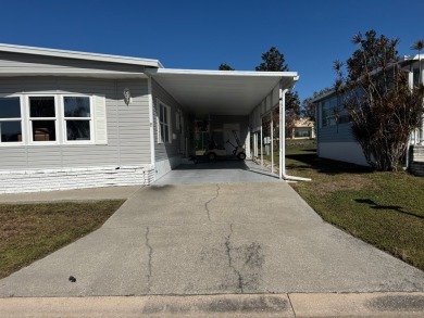 This elegantly updated 1973 home offers modern charm and on Heather Hills Golf Course in Florida - for sale on GolfHomes.com, golf home, golf lot